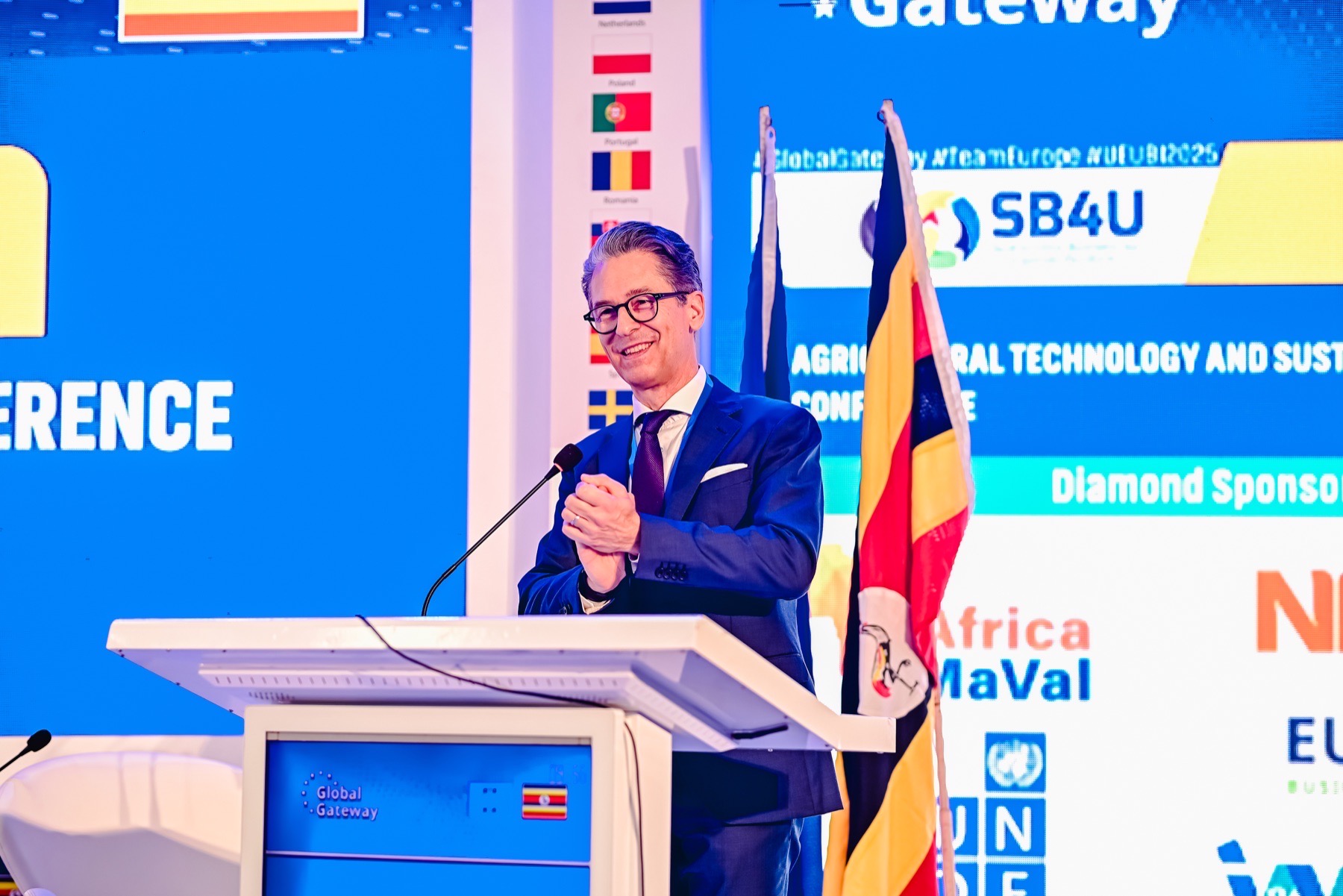 Global Gateway speaker addressing a Uganda business conference