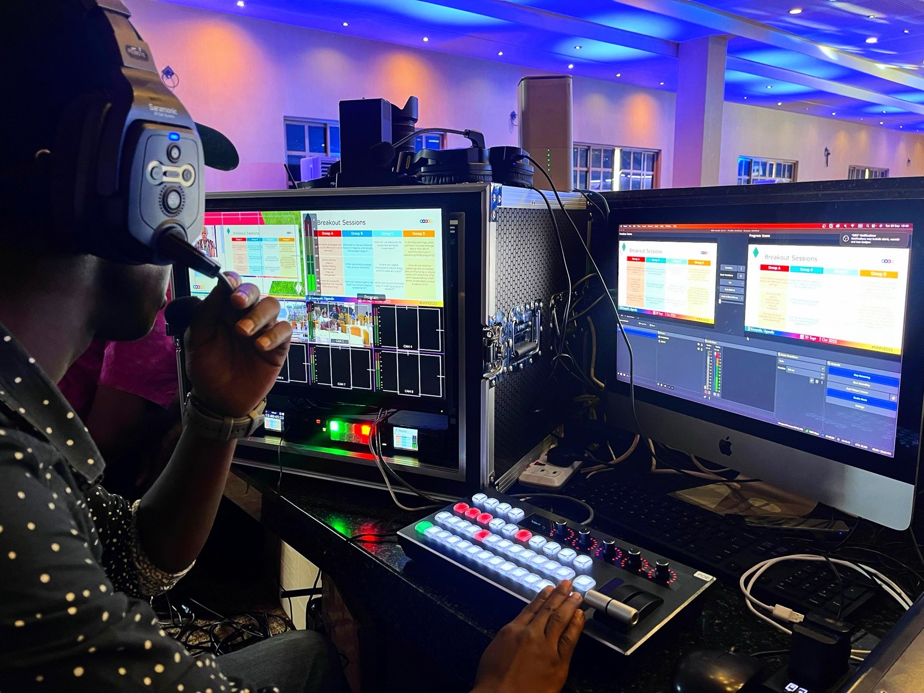 Technical director managing livestream monitors and production controls
